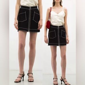 Mcq contrast mini skirt.  Fits big